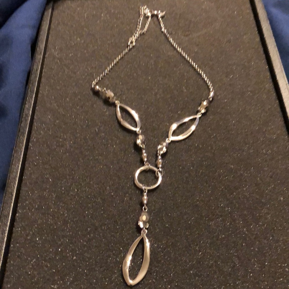 Silver necklace.